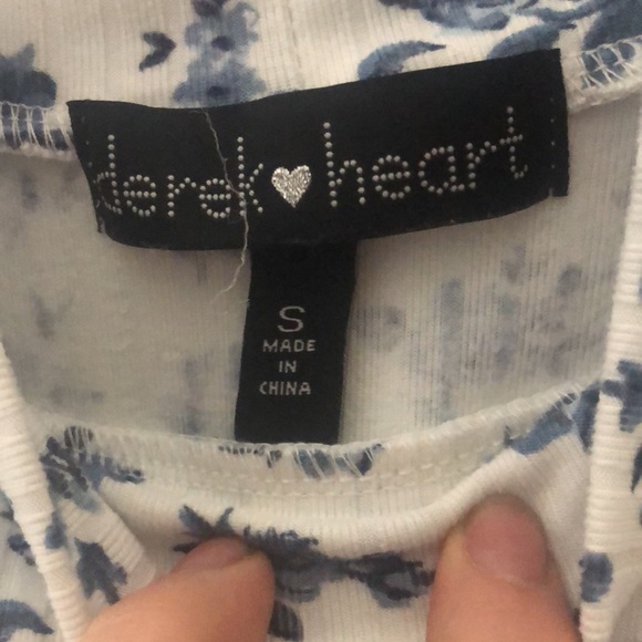 A low turtle neck blouse, small, white with blue flower print. - Picture 2 of 2